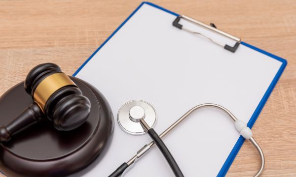 Home 15 medical law and justice concept with stethoscope a 2025 03 13 01 27 28 utc scaled a9e78ae9
